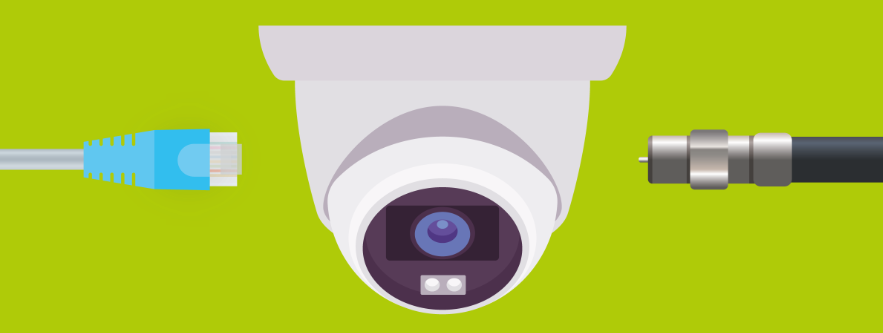 Ip cable and analogue cable going into a dome camera on a green background
